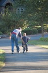 Don teaching Theo how to ride a bike, September 13, 2010. Photo by Amy Rauch Neilson.